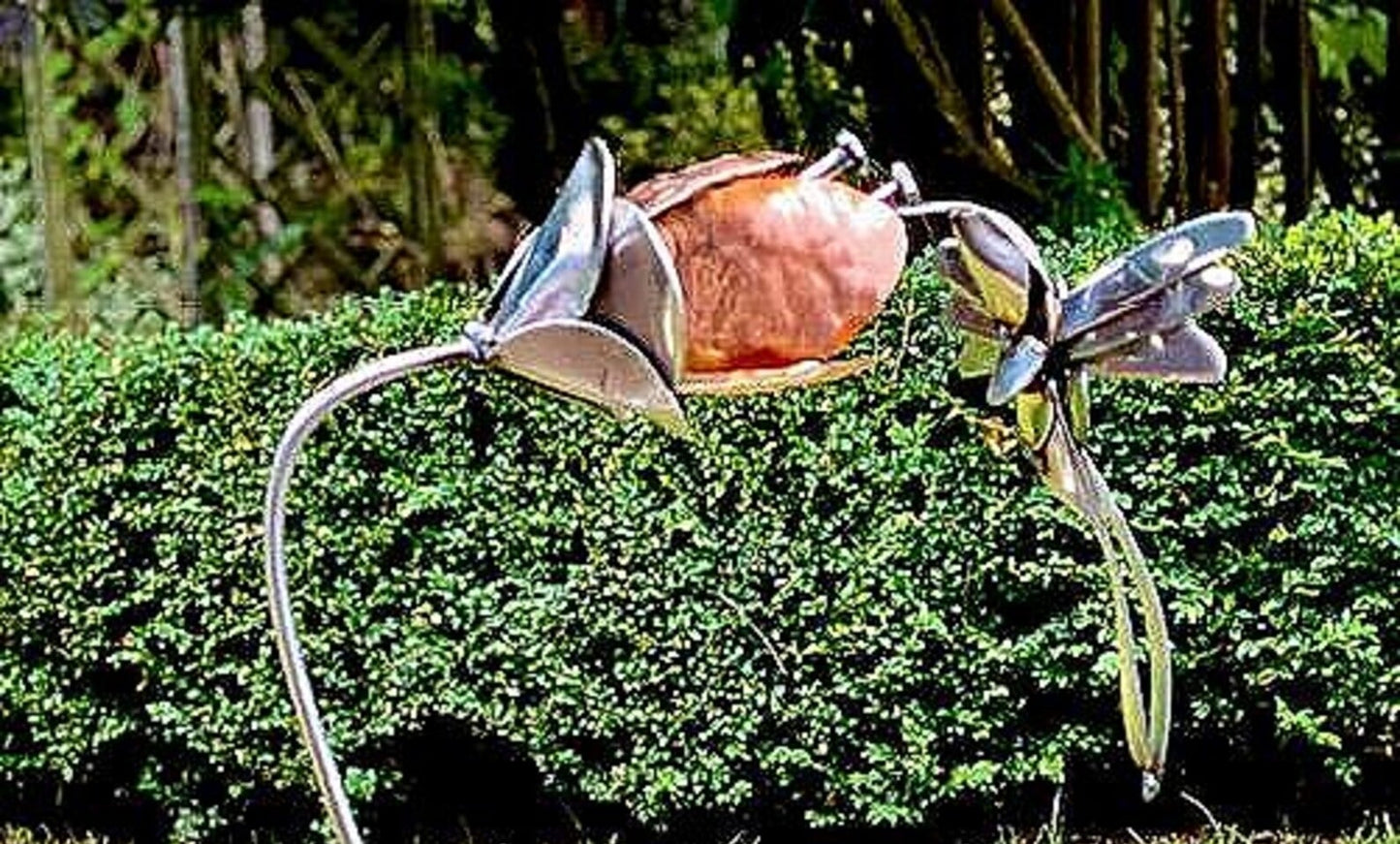 Hummingbird and flower sculpture