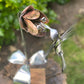 Hummingbird and flower sculpture