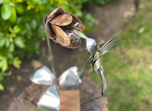 Hummingbird and flower sculpture