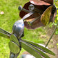 Hummingbird and flower sculpture