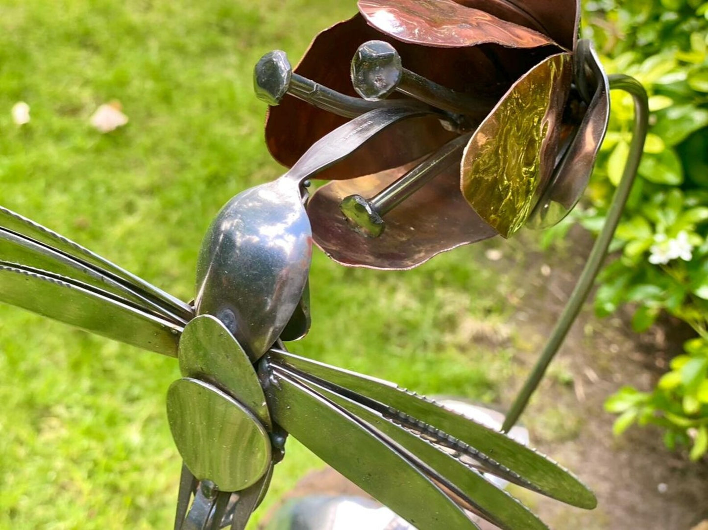 Hummingbird and flower sculpture