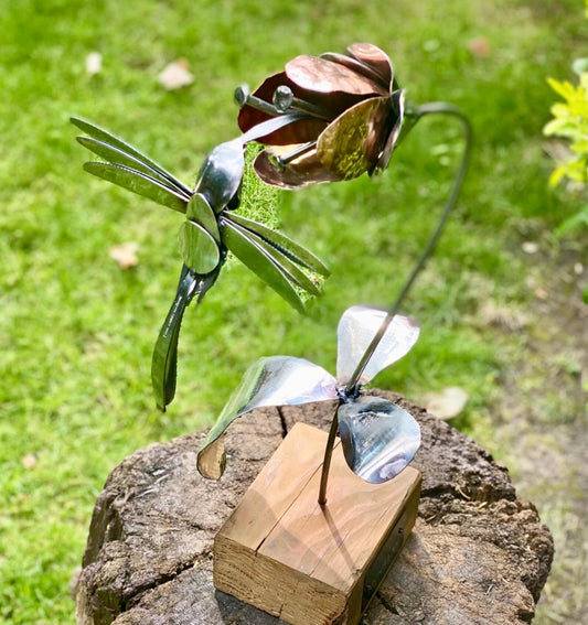 Hummingbird and flower sculpture